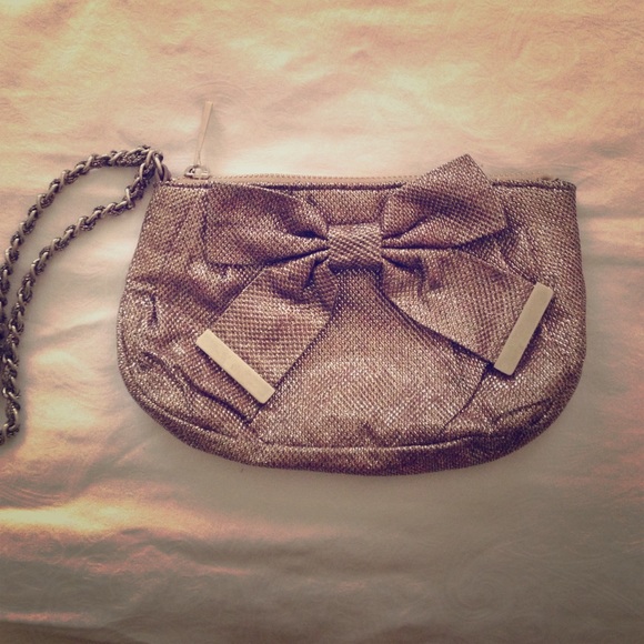 Express shimmery bow wristlet