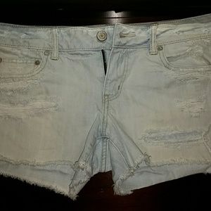 Destroyed denim shorts