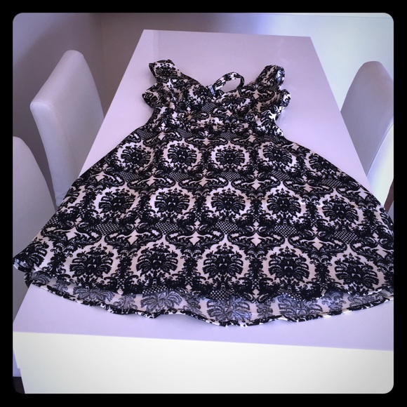 SOLD Brand new tie back dress