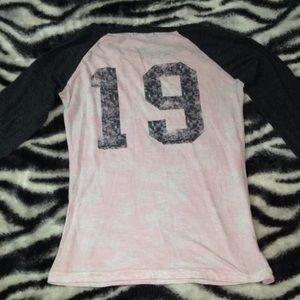 Quarter sleeve baseball style shirt