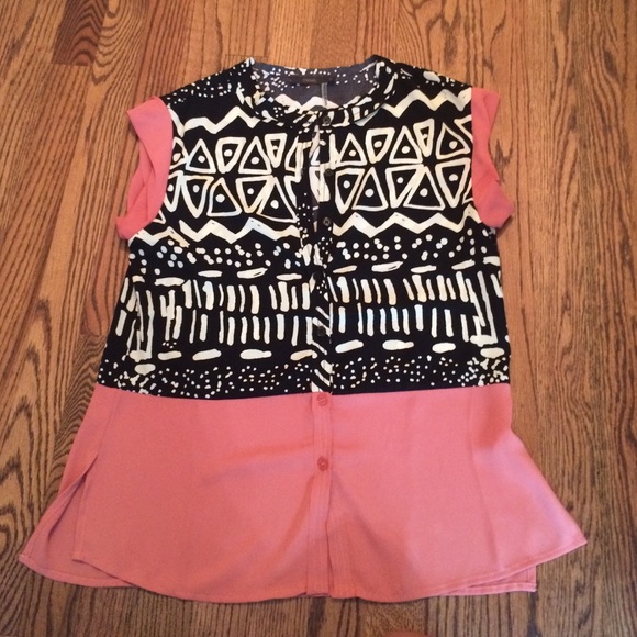 reddish- brown with black & white pattern blouse!