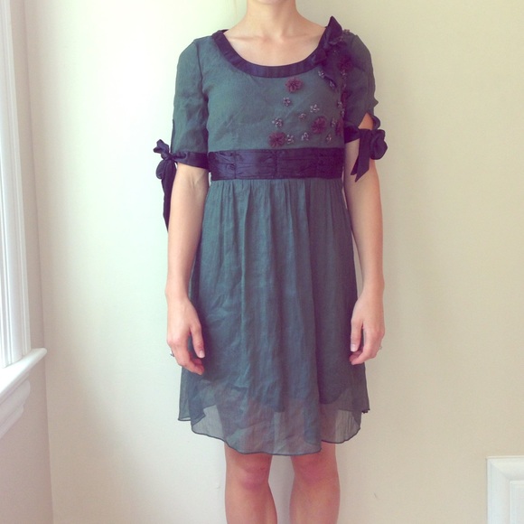 Dark green dress with flower appliqués