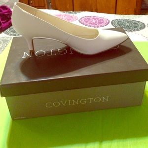 Cara white low heel pumps