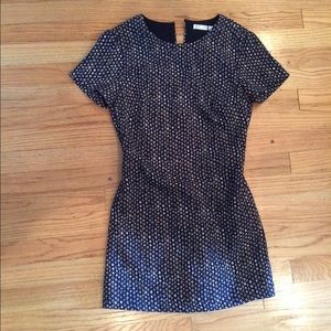 Patterned mini romper/dress with open back