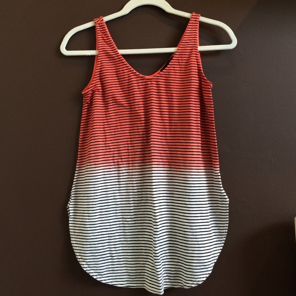 A orange and white, stripped ombré tank
