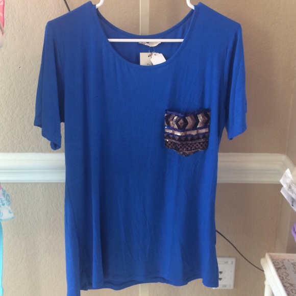 Blue shirt with cute frocket