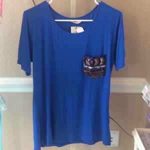 Blue shirt with cute frocket