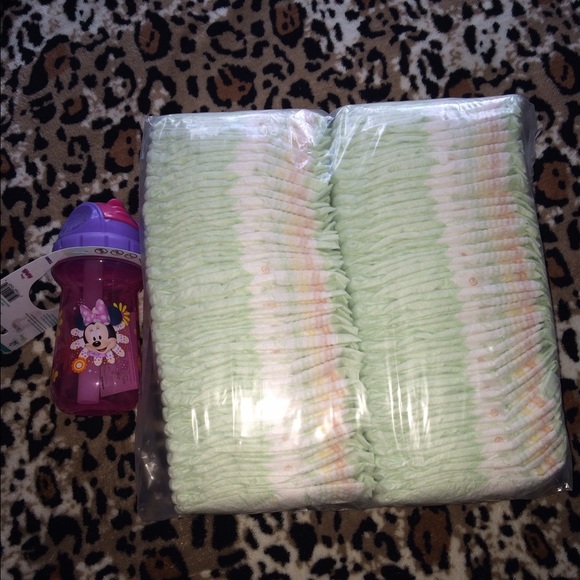 Brand new sippy cup w package of huggies diapers