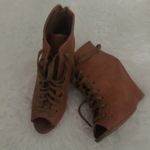 Cognac laced peep toe wedges.