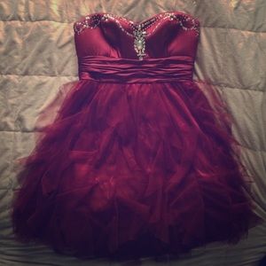 Burgundy short dress with crystal design.