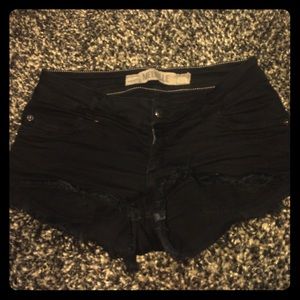 Brandy Melville low rise black denim shorts