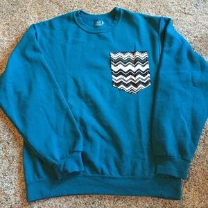 Pocket crew necks