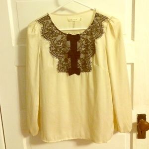 Ivory chiffon top with 3 black bows!