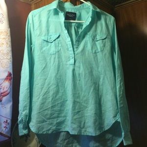 Light blue long sleeved shirt