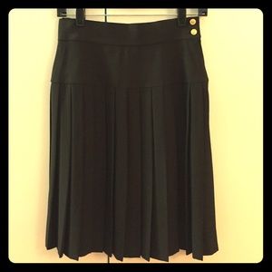 90s high waisted Chanel skirt with gold buttons.