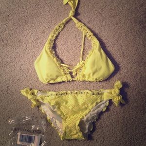 Bright neon yellow Victoria secret swimsuit