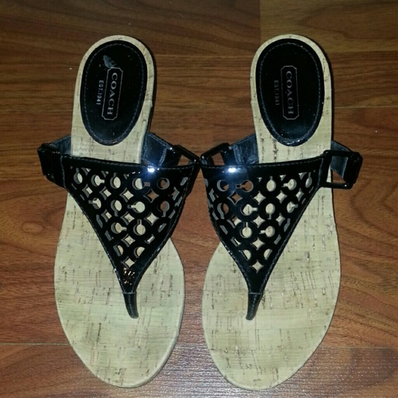 Coach 7 1/2 D wedges.