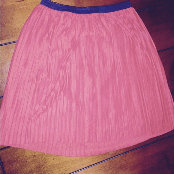 Red accordion fold skirt