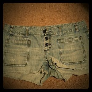 Distressed denim shorts