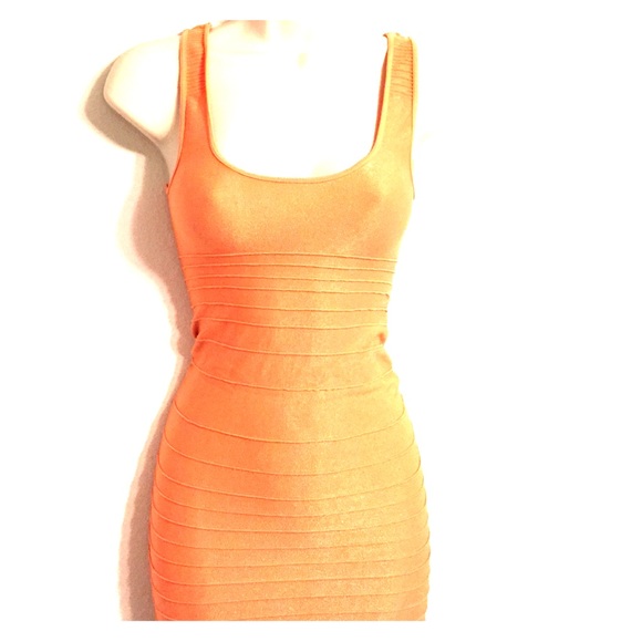 Classic Bebe bandage dress in creamsicle color!