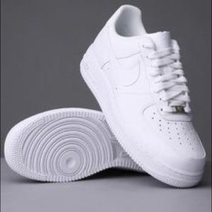 All white nike Air Force ones (1s)