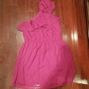 Magenta ruffle dress.