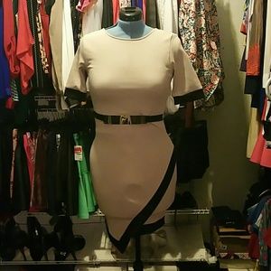 Tan with black trim dress