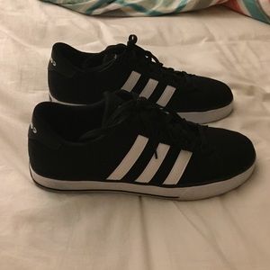 Black Adidas shoe for men and women