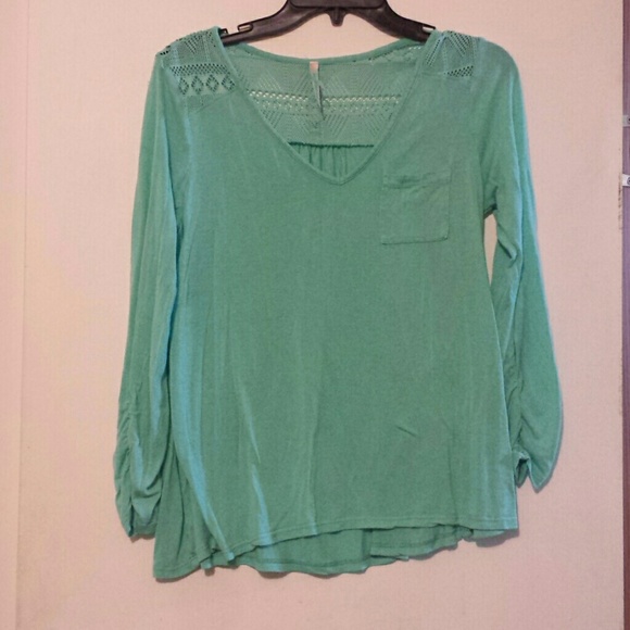 Turquoise top with back detail