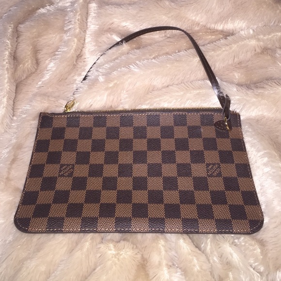 New lv Vuitton never full pouch! Great condition
