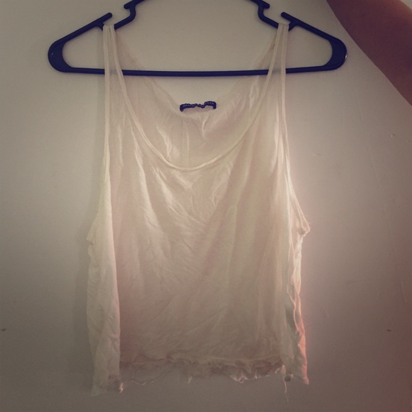 Brandy Melville light, light pink sheer tank top.