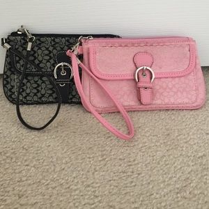 Black and Pink Coach Wristlets