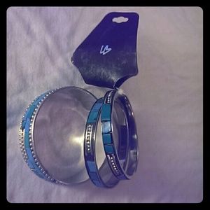 Set of 3 silver-tone bracelets (new with tags)