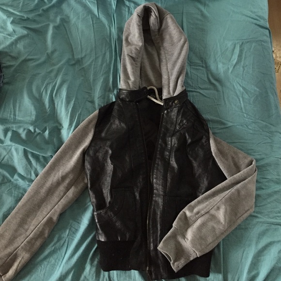 Leather jacket with sweater sleeves