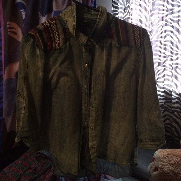 button up shirt with collar and cute design.