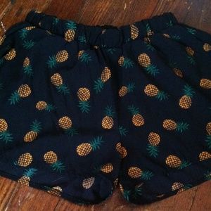 Black pineapple shorts