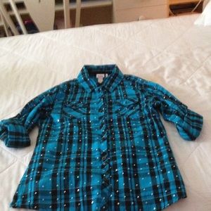 A sequin button up shirt