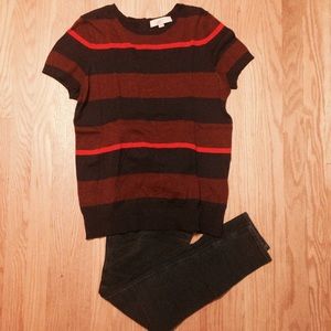 Maroon and blue top with red-orange stripe