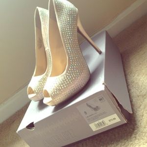 Jennifer Lopez blingy blush high heels