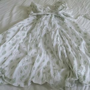 White dress with green pattern