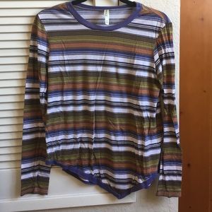 RVCA long sleeve colored shirt. Diagonally cut