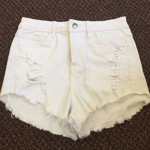 Brandy Melville white high wasted shredded shorts