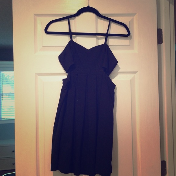 Black cocktail dress with side openings