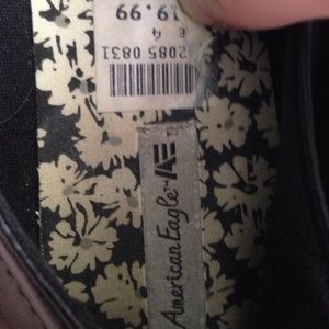 black crossed bow tie flats