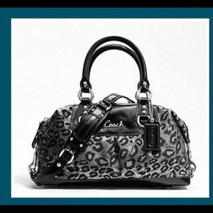 Black cheetah coach handbag