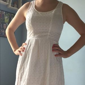 White lace dress with cut outs in the back