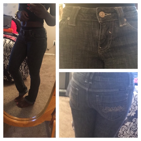 Black denim straight leg jeans.