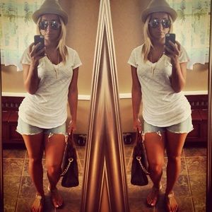 American Eagle ripped shorts.