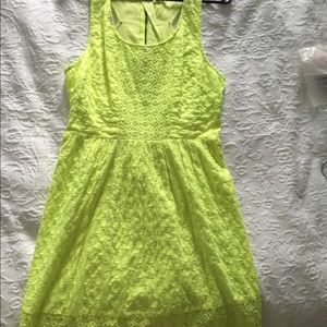 Lime green lace dress with cut outs in the back