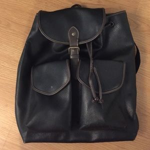 Mid sized synthetic leather backpack